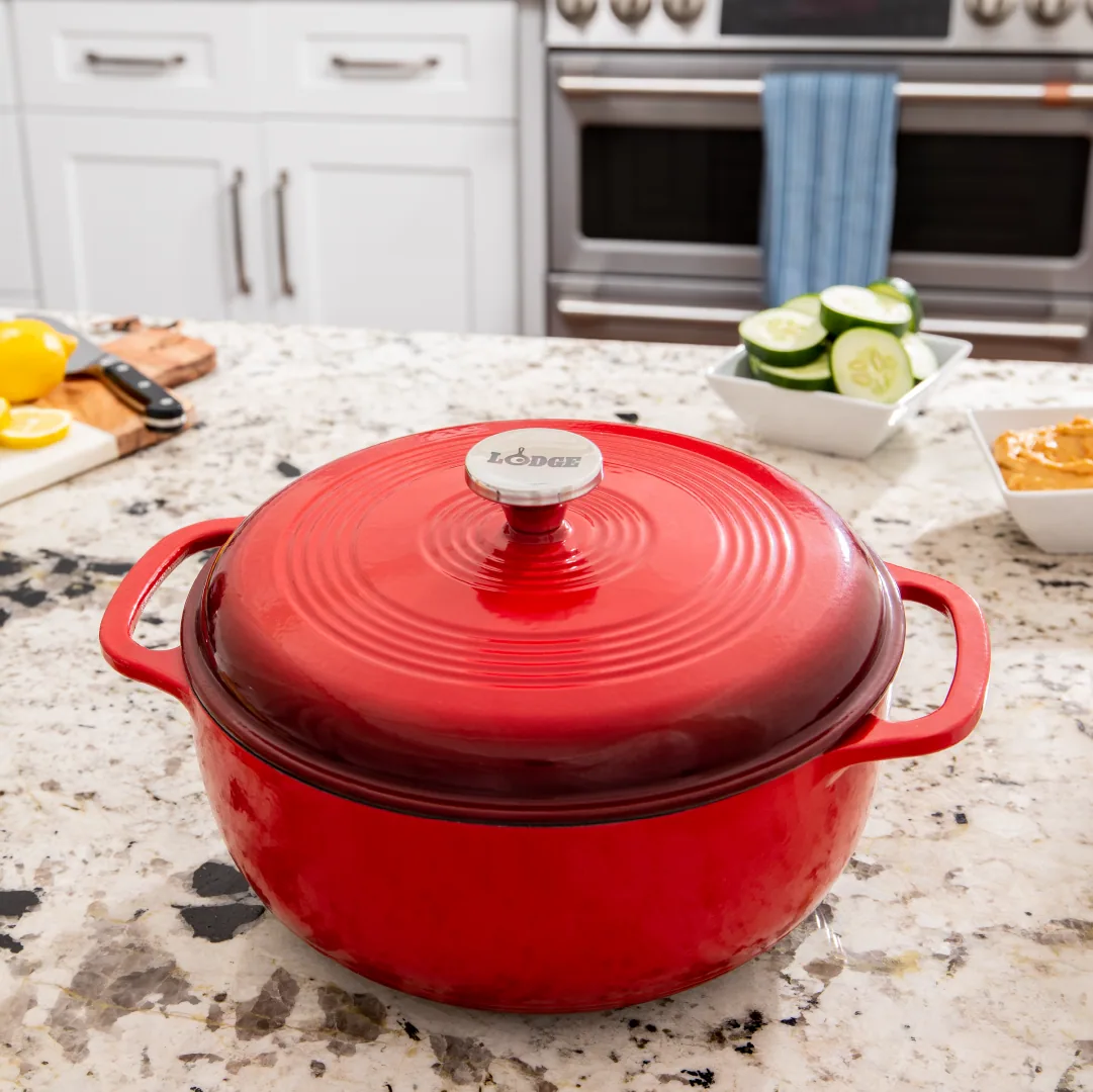 Red pot shown in a kitchen setting.