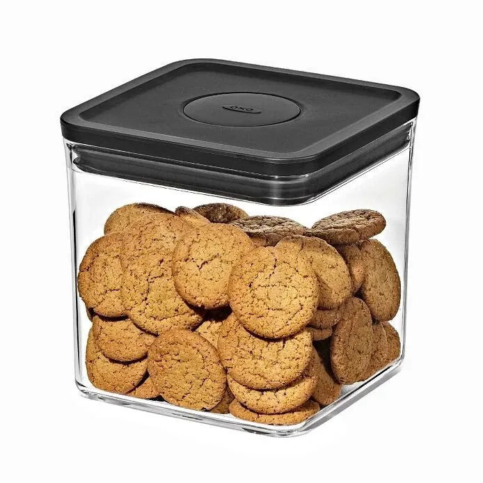 Three-quarter view shows the push-button lid.