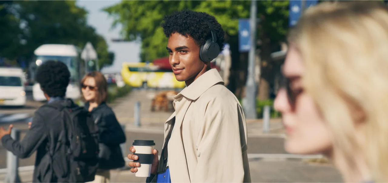 Sony lifestyle image shows the headphones worn outdoors.