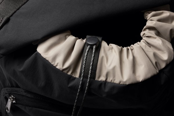 Bellroy Cinch Backpack: The drawcord gathers the top beneath the foldover lid.