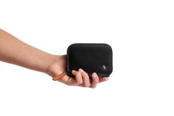 Bellroy Folio Mini: Hand-held product photography offers context for its scale.