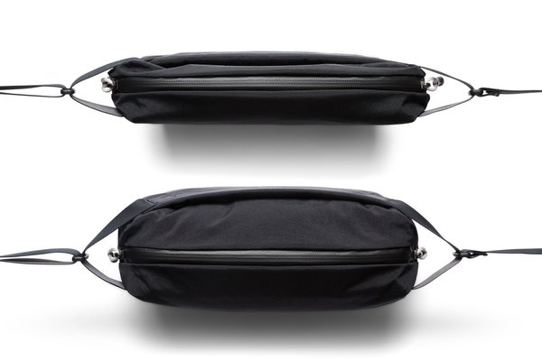 Two views of the black Lite Sling showing a flatter shape and an expanded side profile