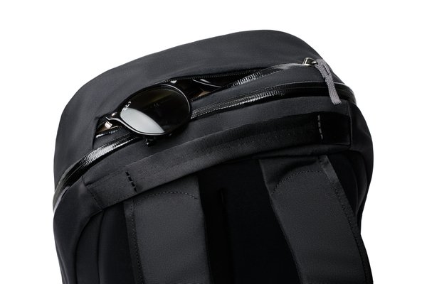 Bellroy Via Backpack: A raised pocket holds sunglasses in the manufacturer demonstration.