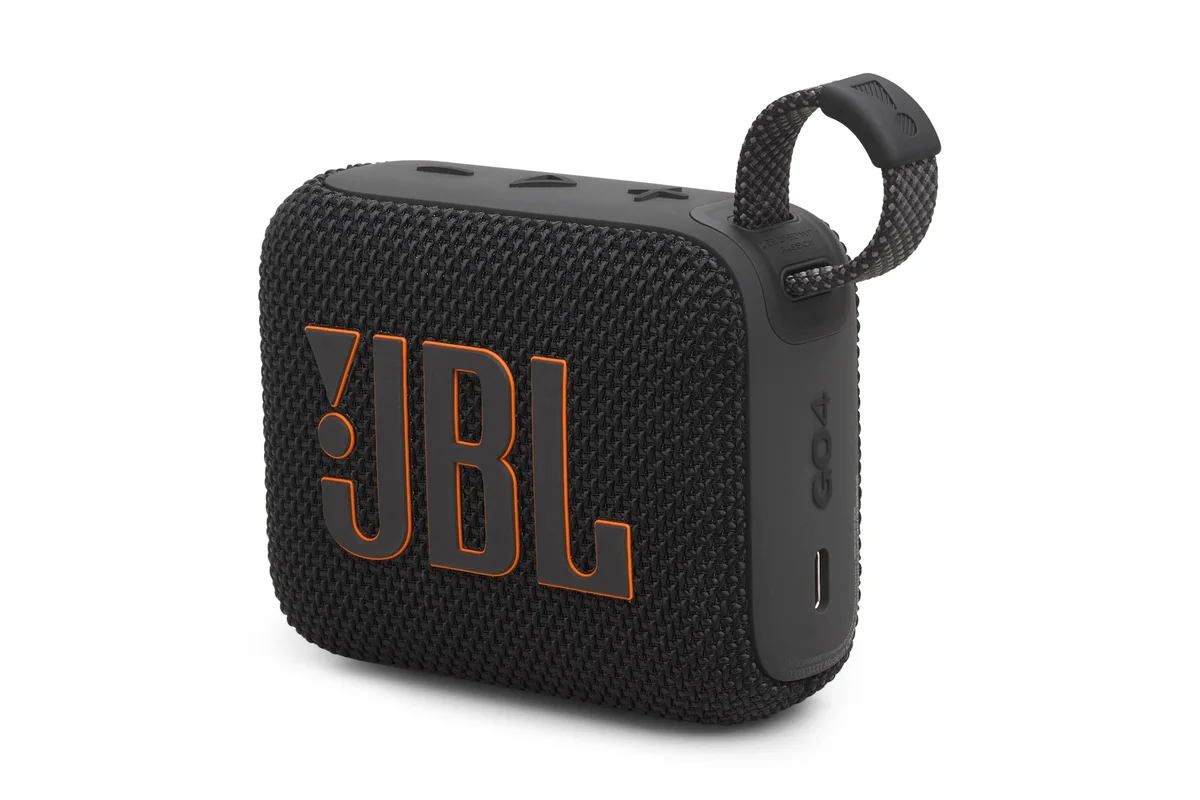 Black JBL Go 4 in an angled view showing its thickness and hanging loop