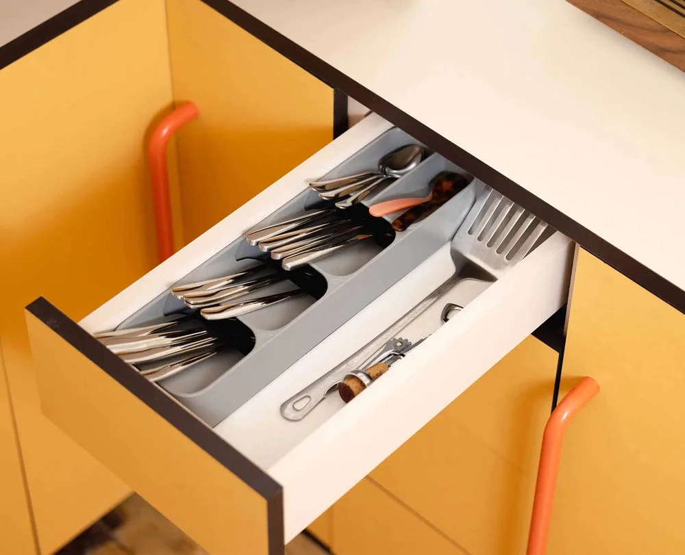 Joseph Joseph compact grey cutlery organiser in a kitchen drawer
