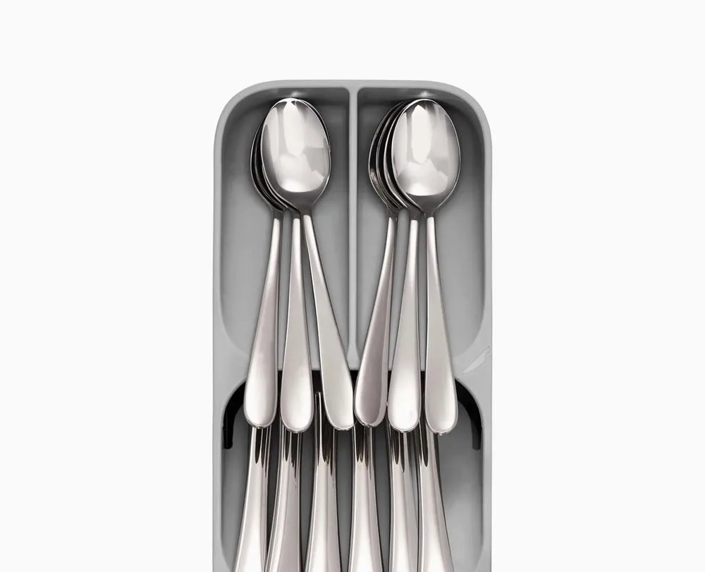 Joseph Joseph compact grey organiser showing its stacked cutlery compartments