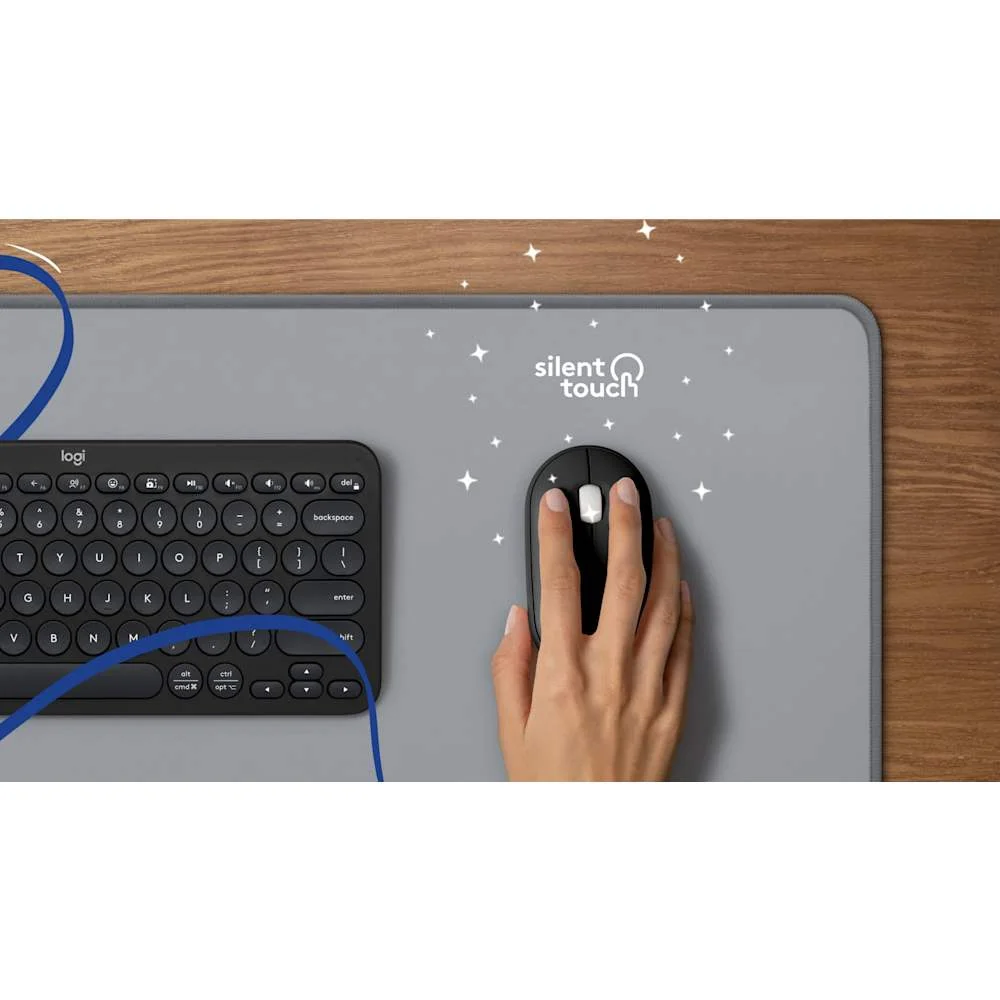 Black Pebble Mouse 2 M350s being used alongside a keyboard on a desk