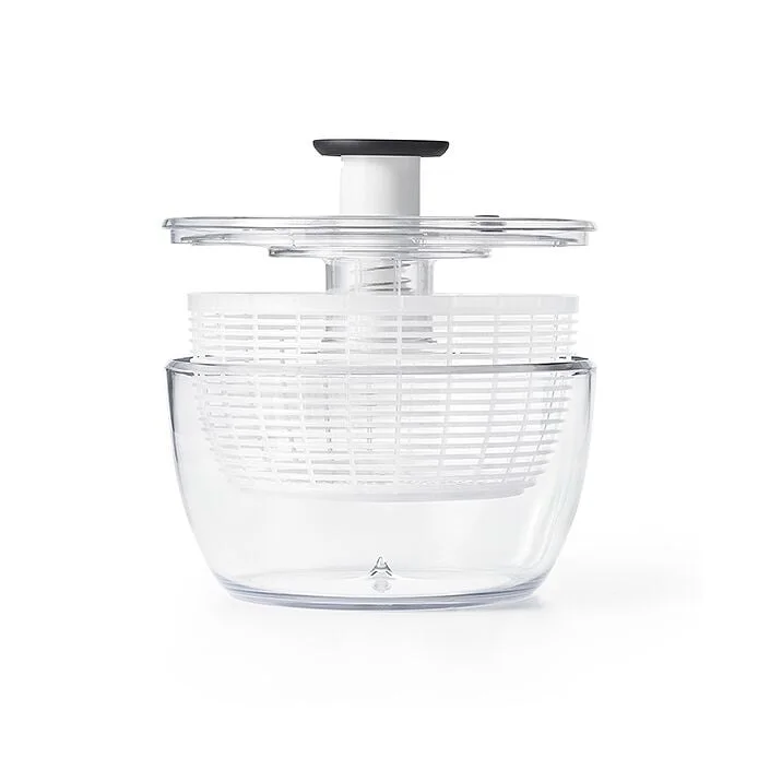 OXO salad spinner with bowl, basket and pump lid lifted apart