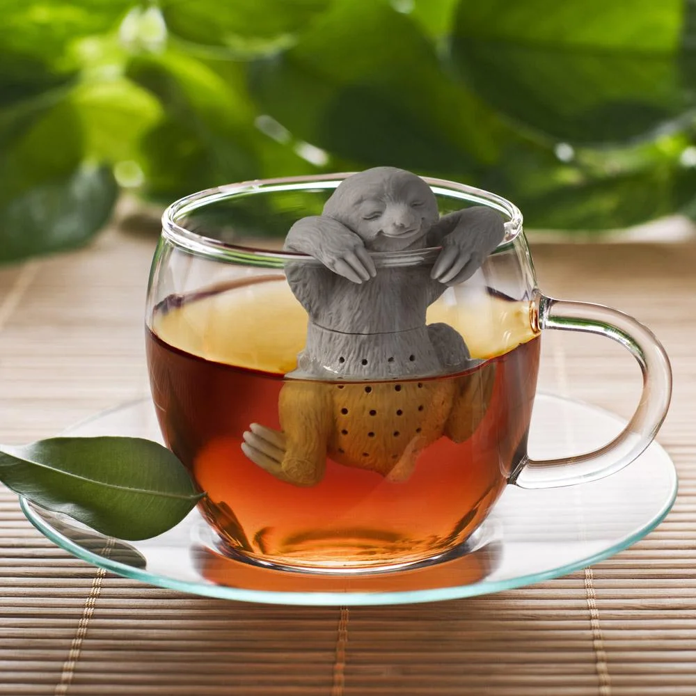 Arms rest over a mug rim; check your own cup's thickness and depth.