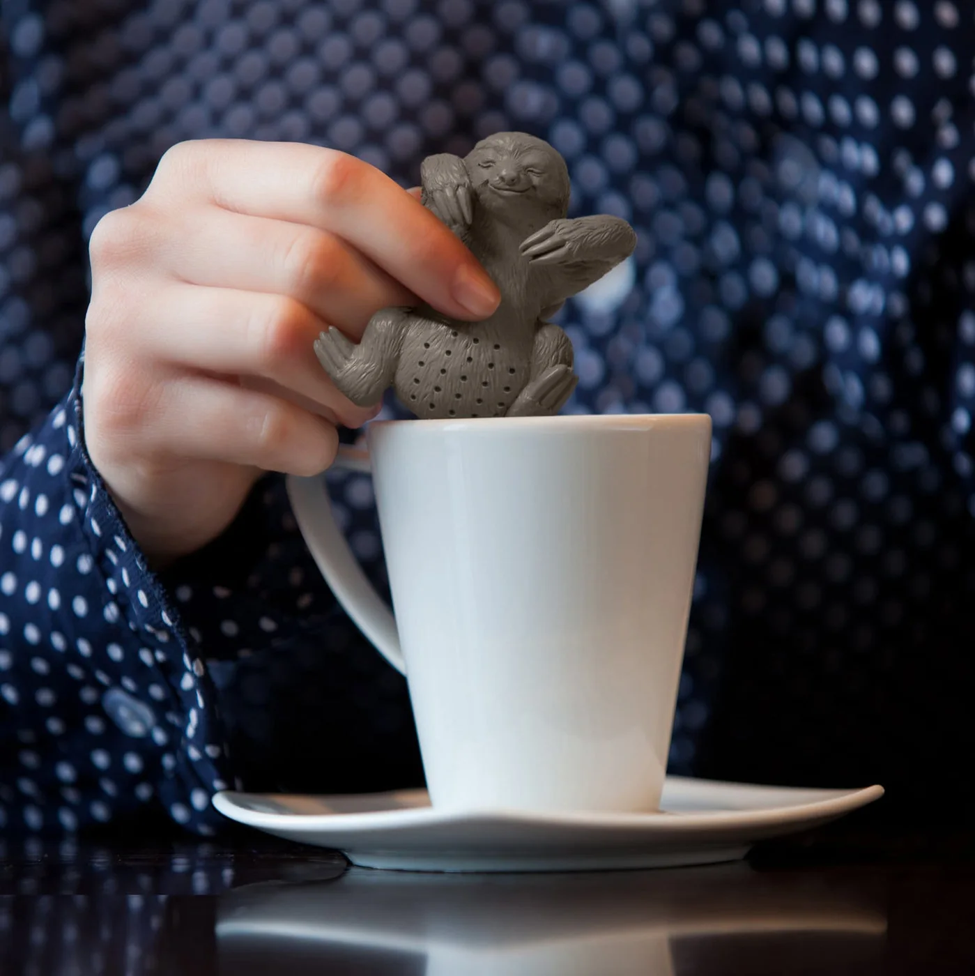 A playful tea-break scene rather than evidence of a universal brewing result.
