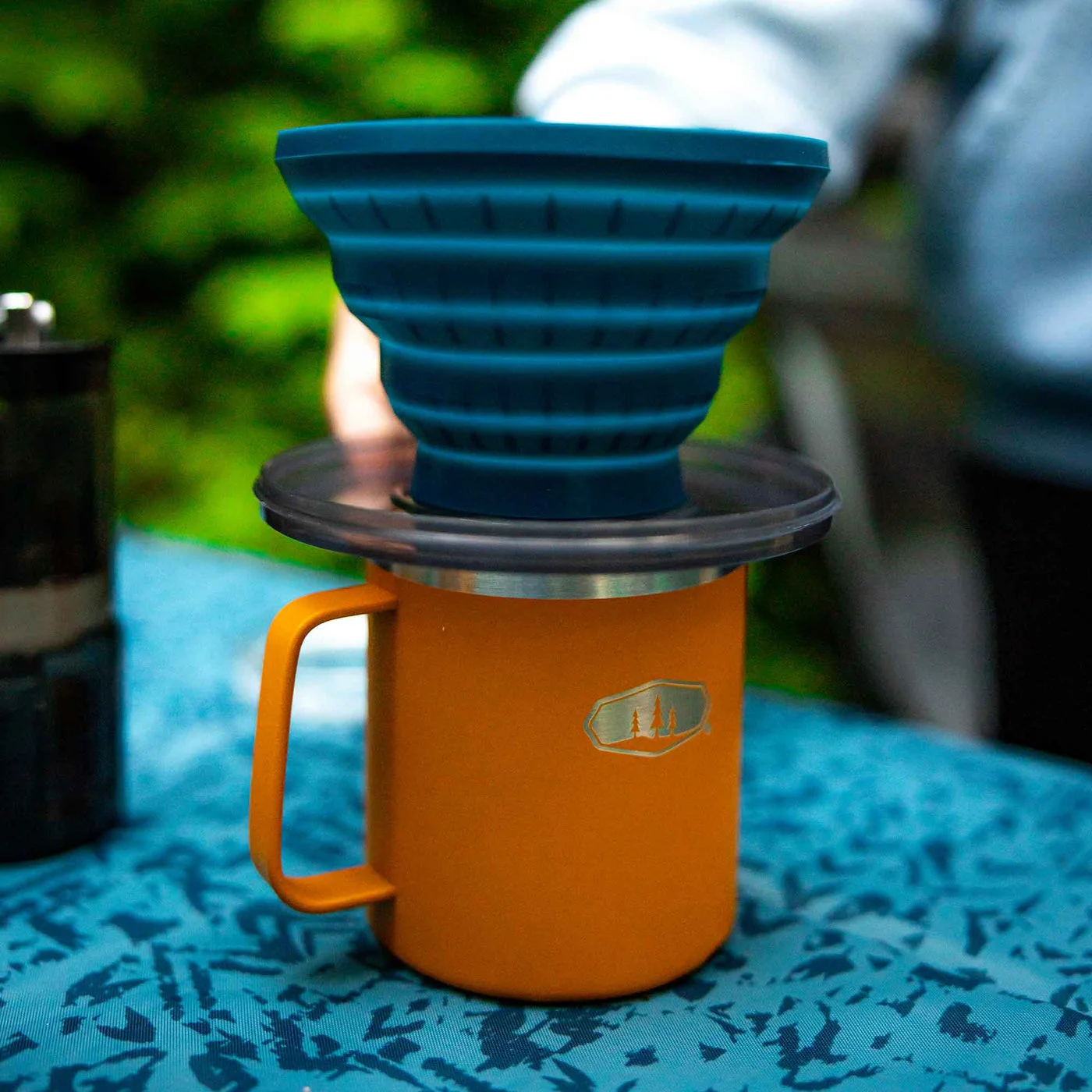 Coffee brewing still requires a separate cup and suitable paper filter.