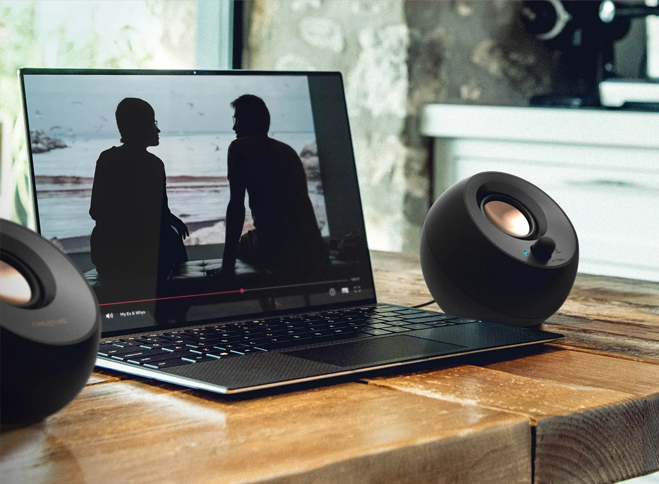 Reference laptop setup; the speakers still need USB power.