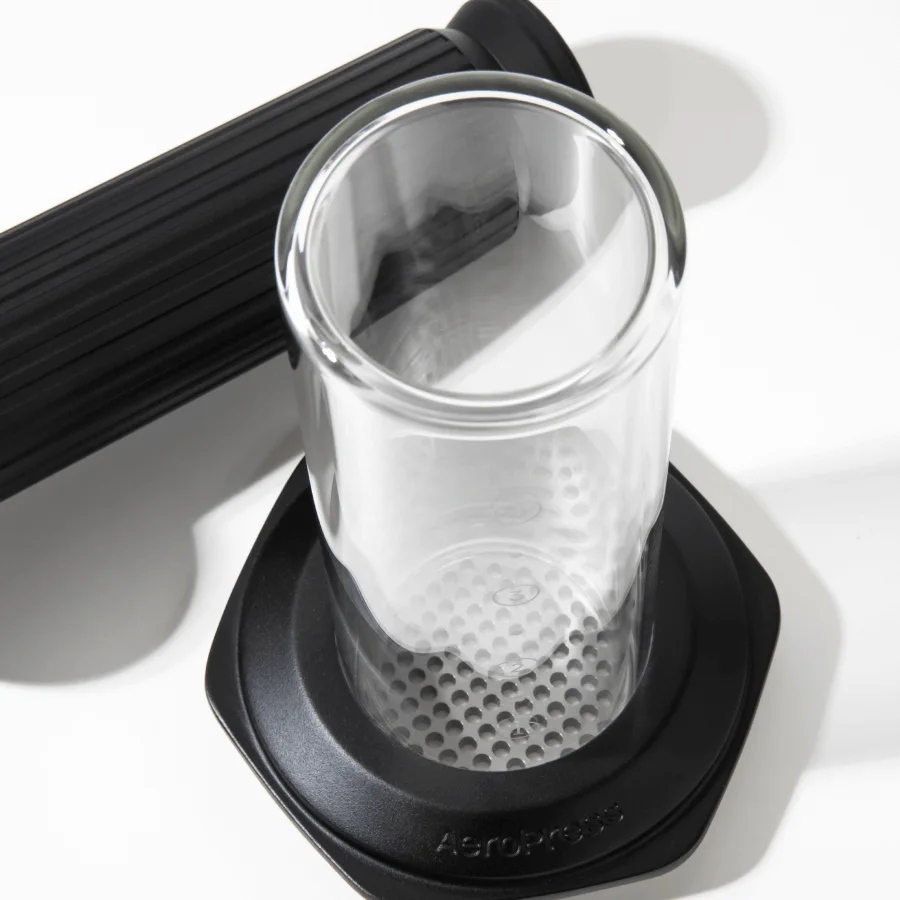 Glass chamber, metal flange and separated plunger make the construction visible.
