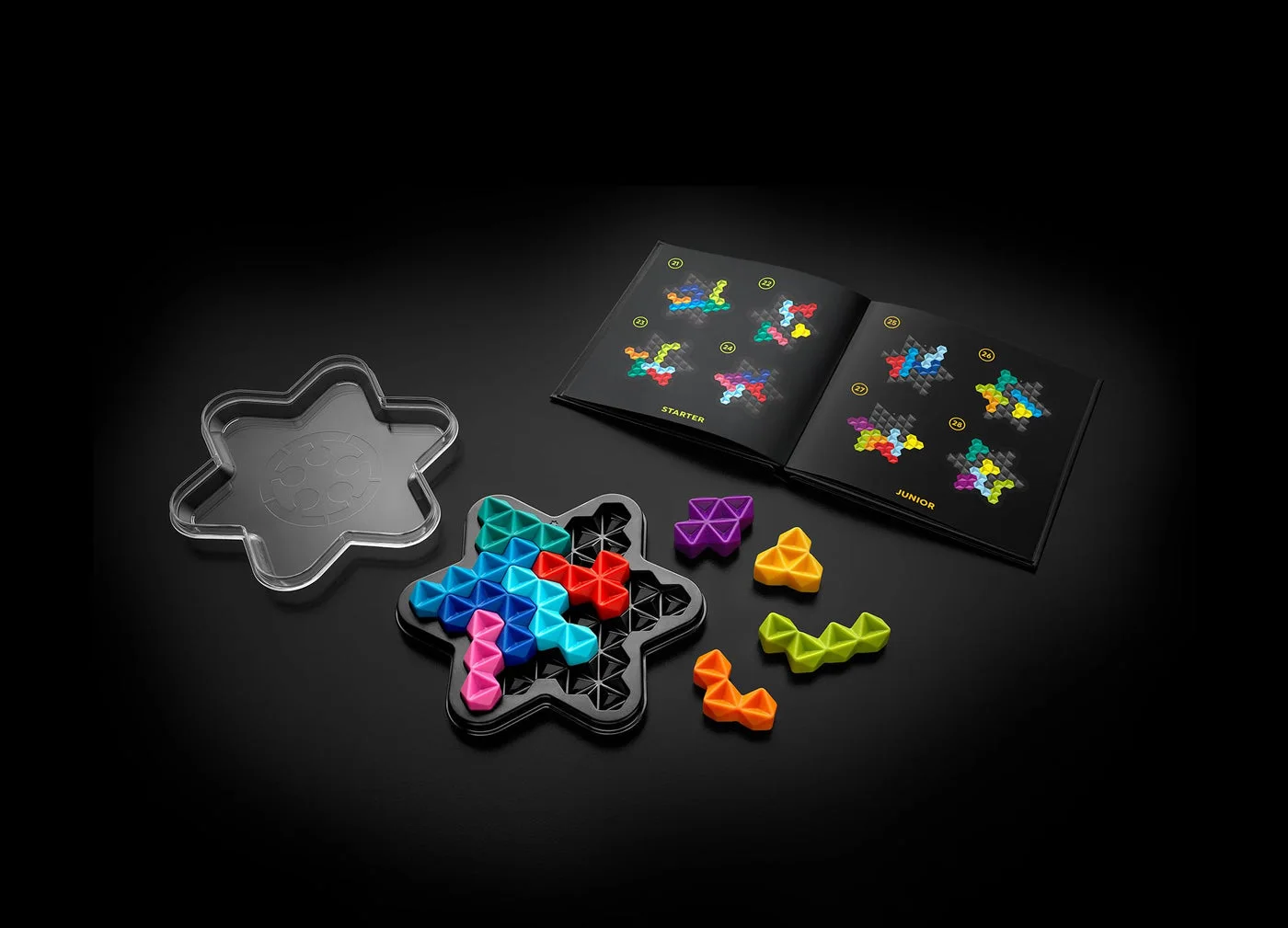 Manufacturer display photograph of the open puzzle kit against a dark background.