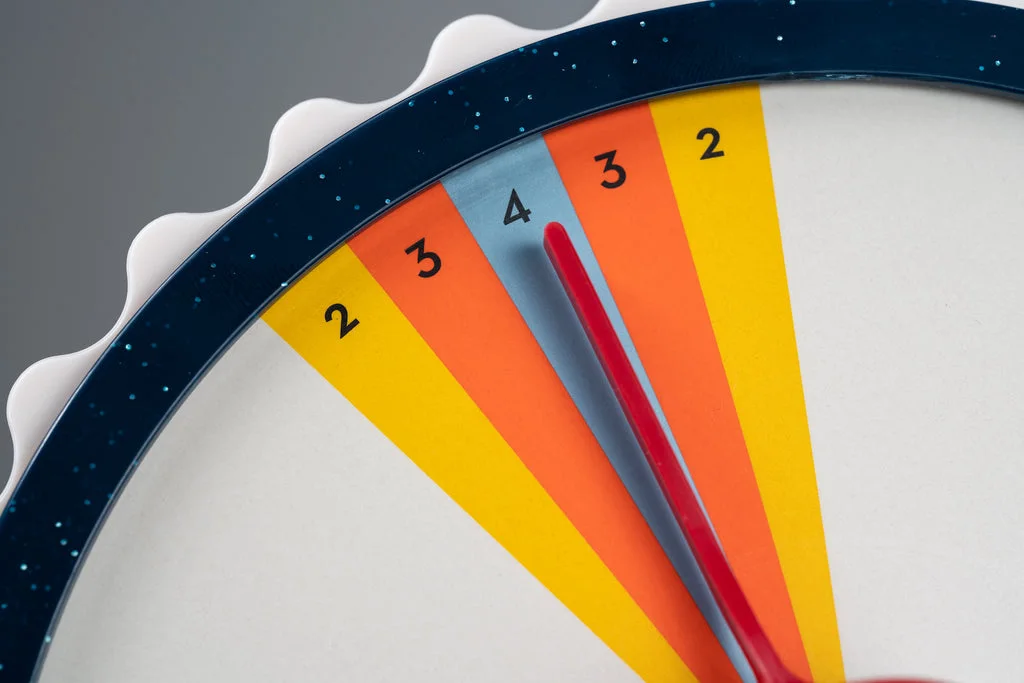 Close-up of the scoring target behind the dial; the concealed position is central to play.