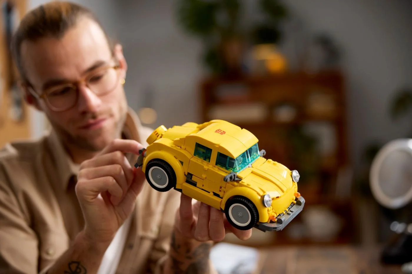 Maker lifestyle scene of an adult handling the vehicle mode.