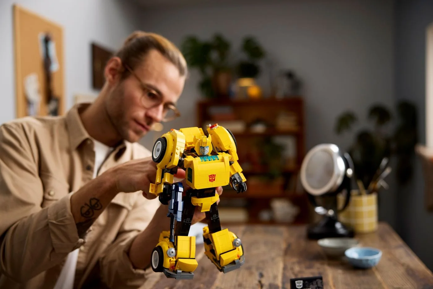 Maker lifestyle scene of an adult posing the completed robot.