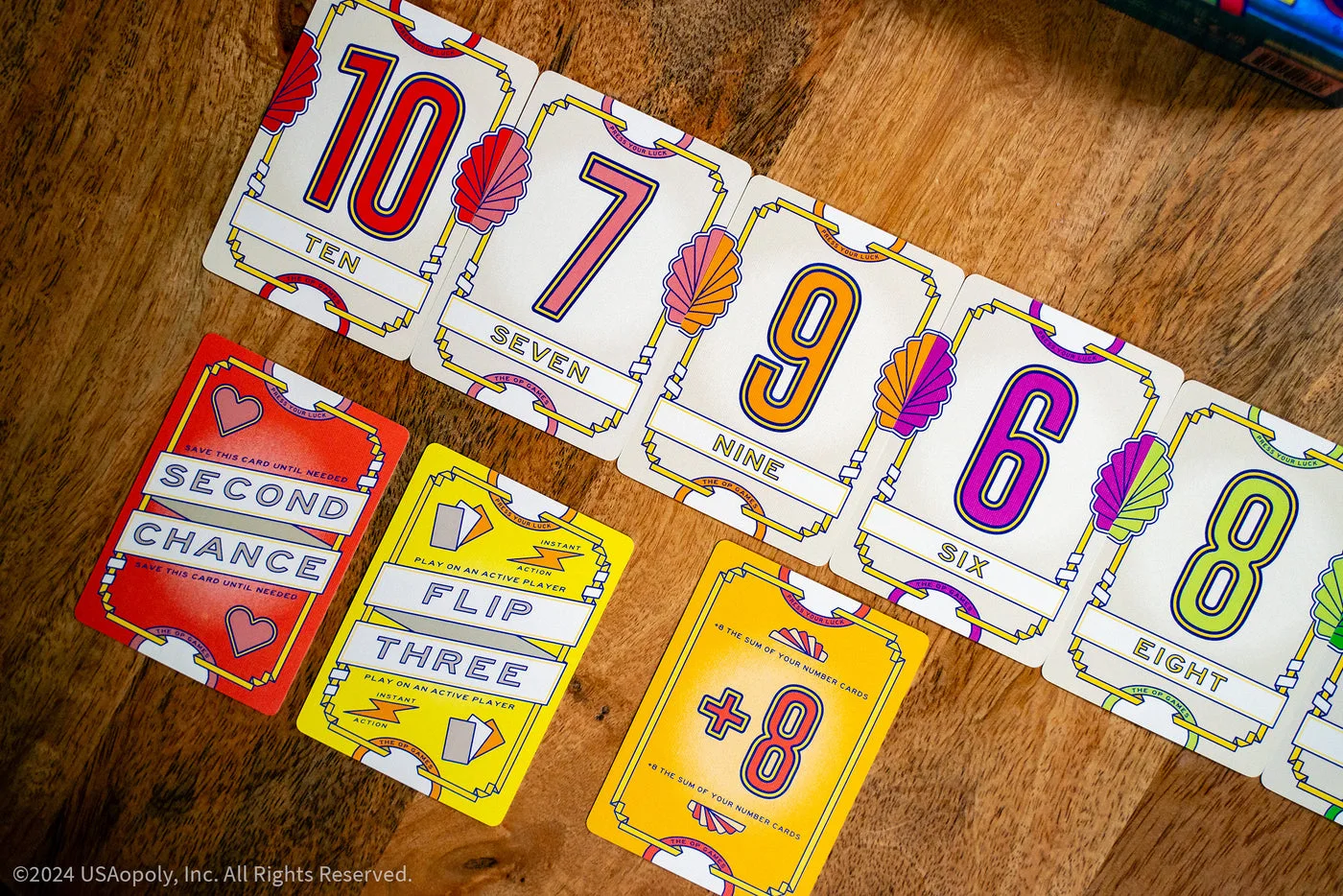 Number, action and modifier cards in close-up.