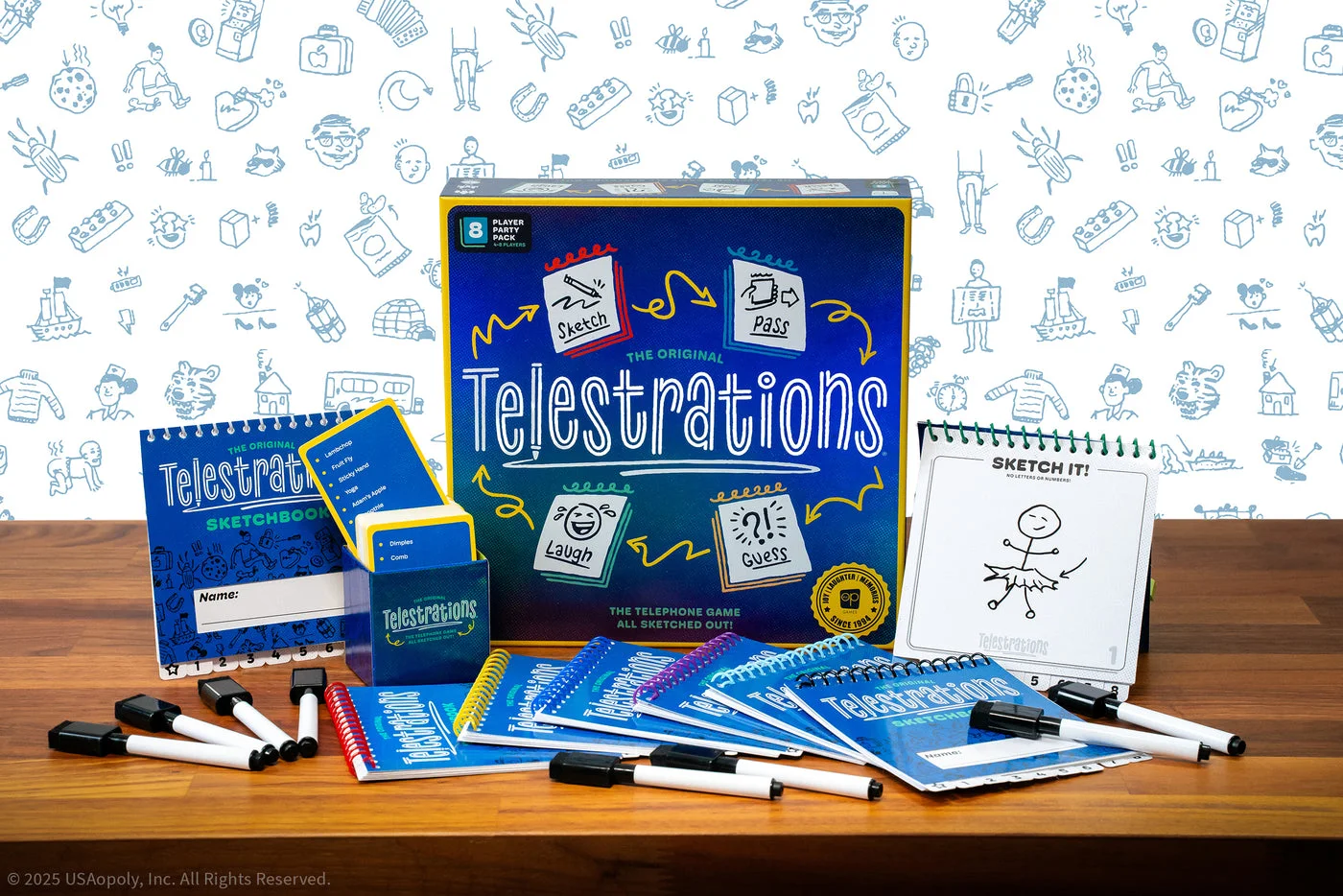 Second-edition books, markers and cards displayed by the maker.