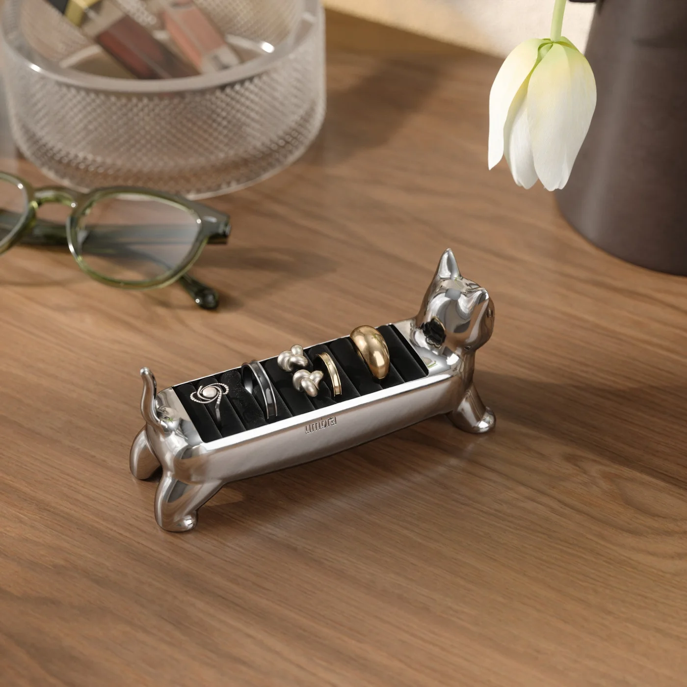 Chrome holder shown on a dresser; scene accessories are illustrative
