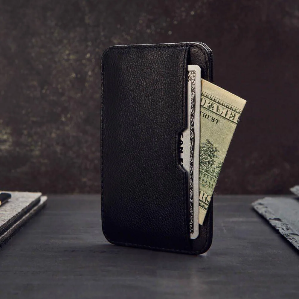 The black wallet shown upright with a banknote.