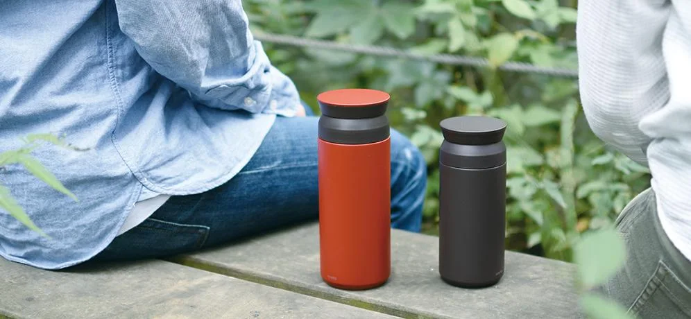 Manufacturer outdoor scene with Black and another colour; the selected listing includes one Black tumbler.