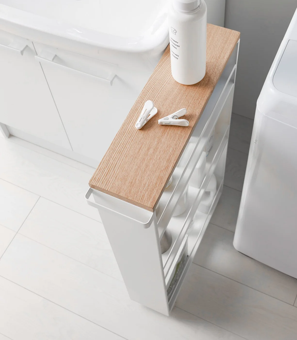 Wooden top and white frame in detail.