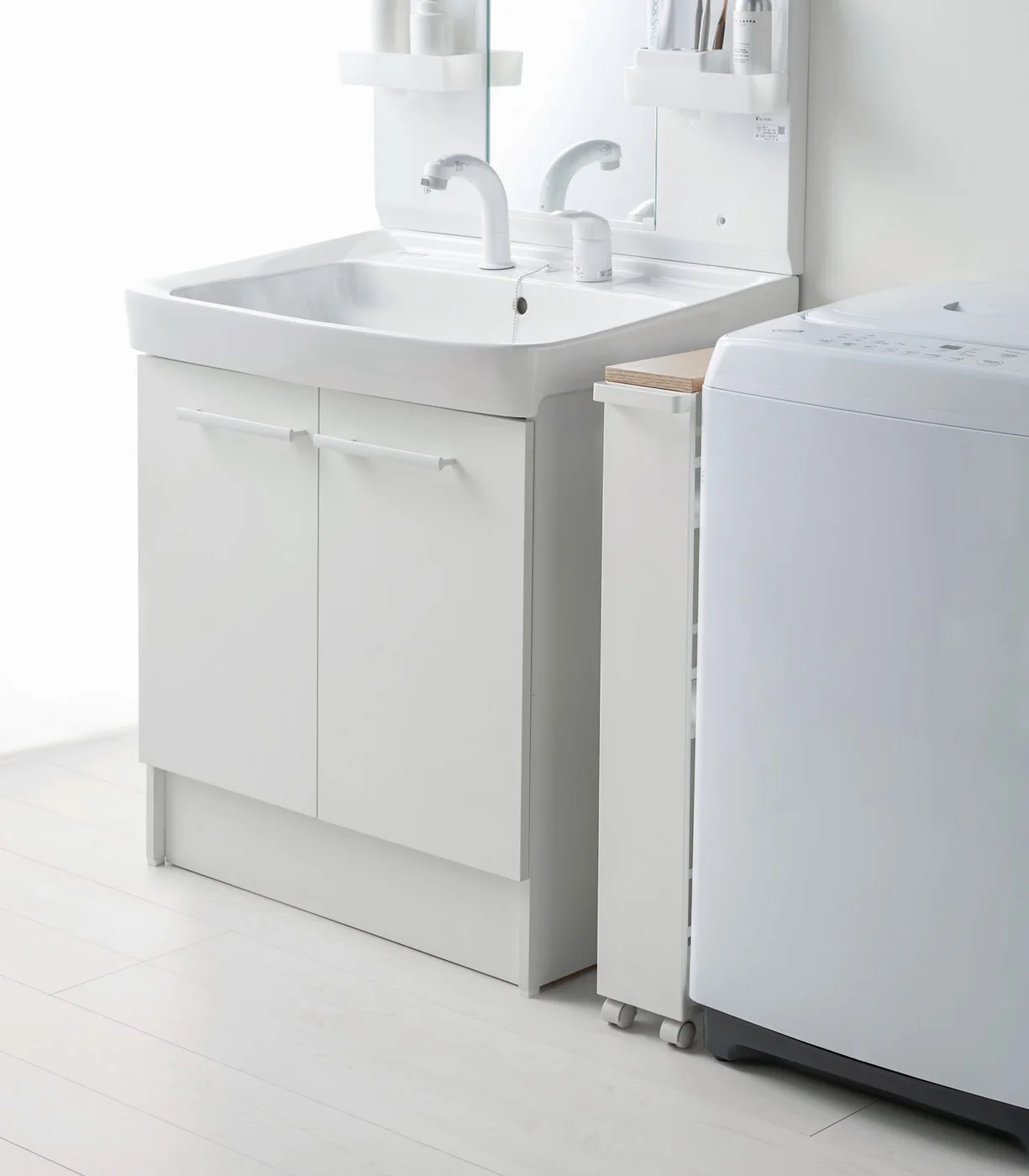 Cart positioned between bathroom fixtures; measure your own gap.