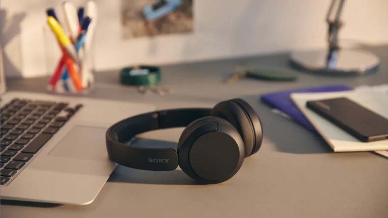 Manufacturer desk scene illustrating switching between personal devices.