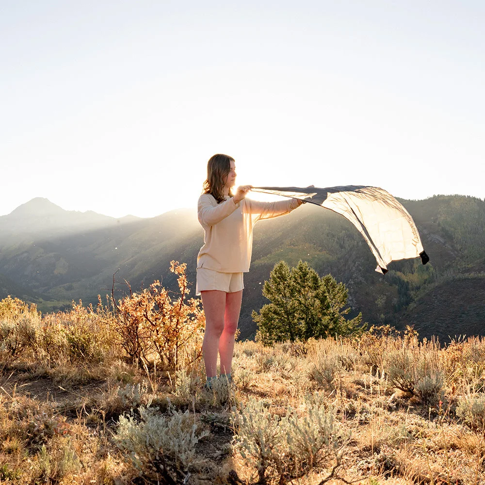 Opening the Mini in a manufacturer outdoor photograph.