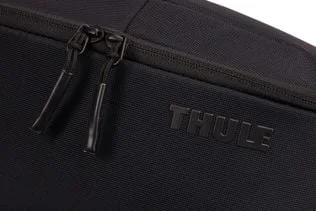 Zip pulls on the selected black toiletry bag.