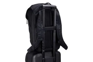 Luggage pass-through on a rolling suitcase.