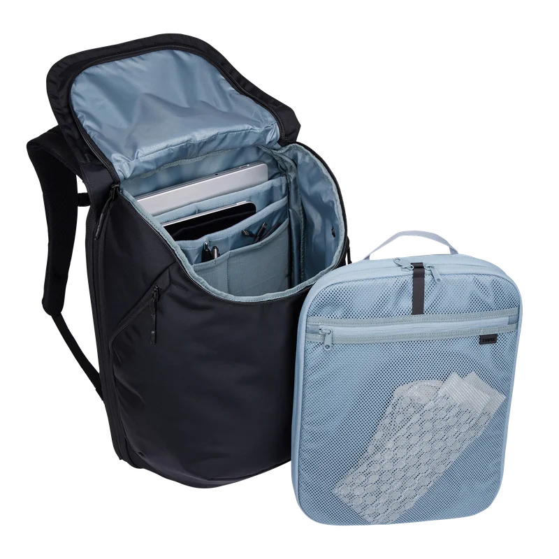 Removable packing cube and open travel compartment.
