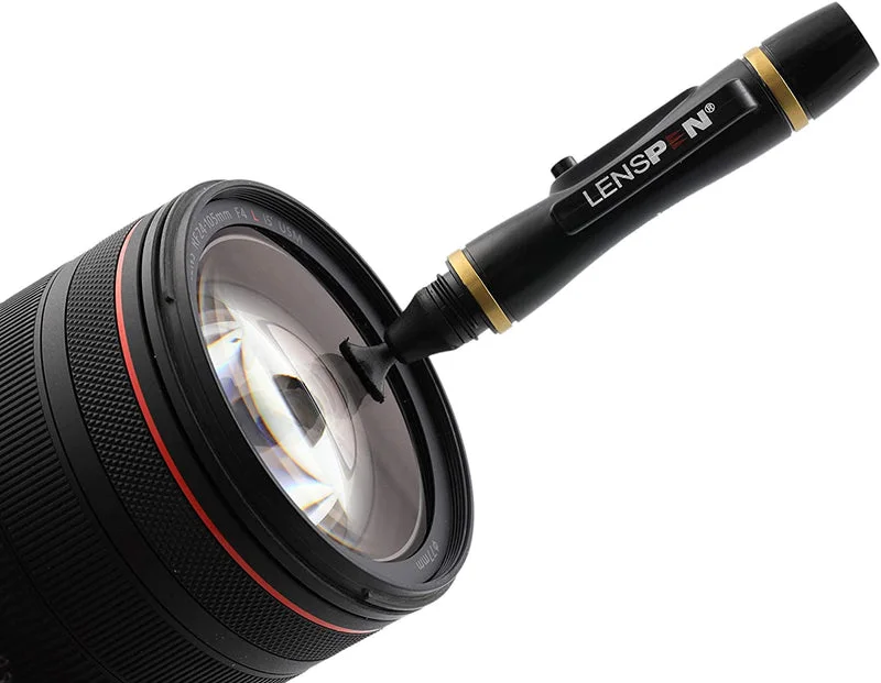 Original LensPen shown at a camera lens; follow equipment-specific cleaning instructions.