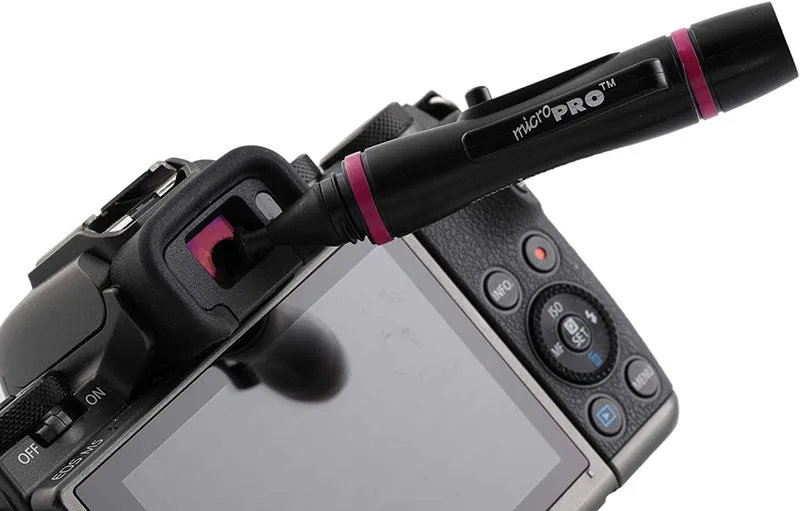 Small MicroPro shown at viewfinder optics; this is not a bare sensor-cleaning demonstration.