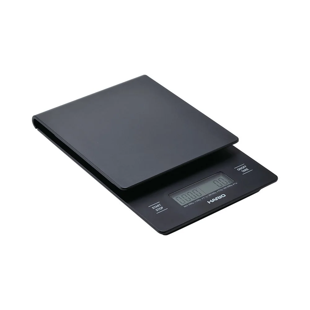 Conventional black V60 scale with weight display and timer controls.