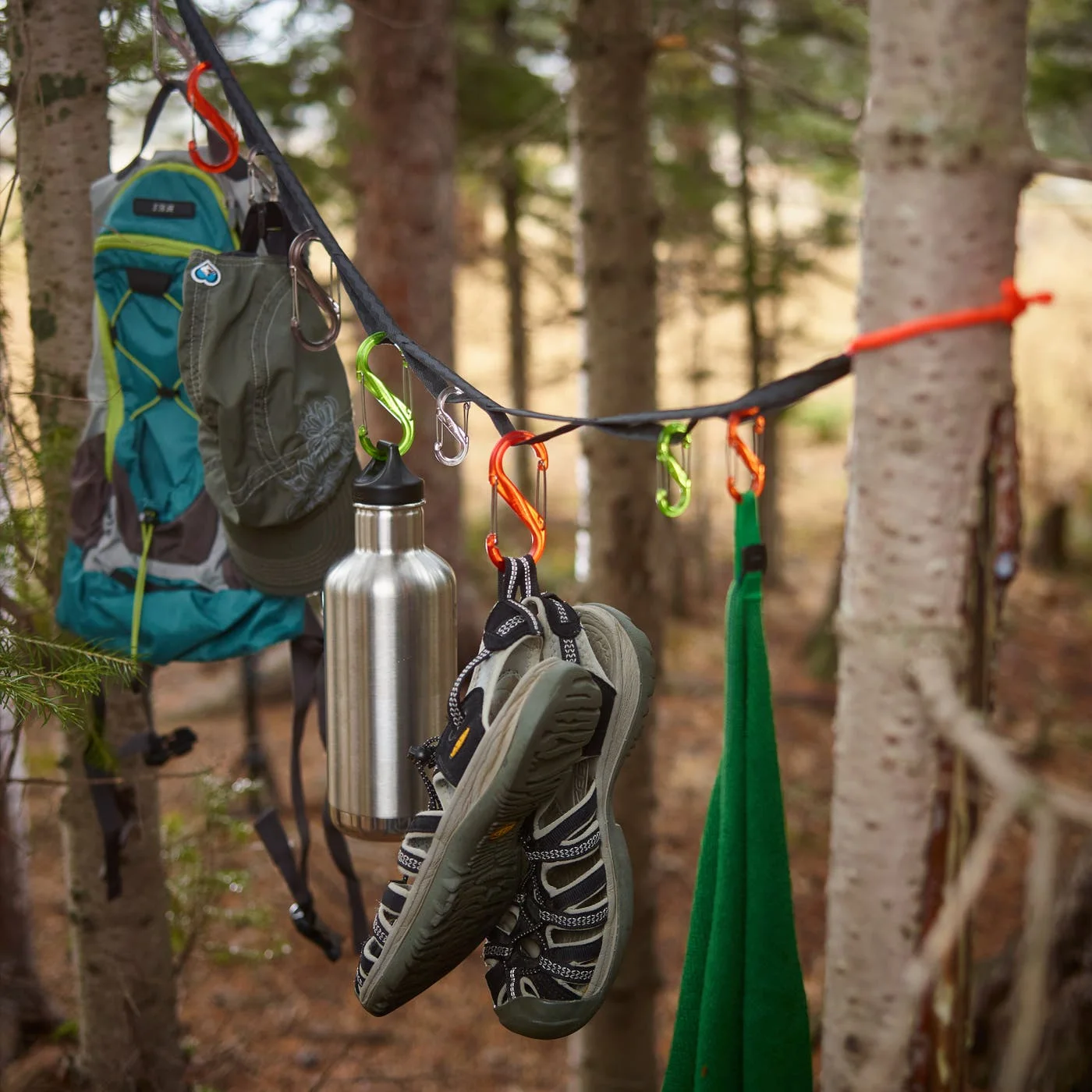 Manufacturer campsite hanging example; gear, footwear and supports are not included.