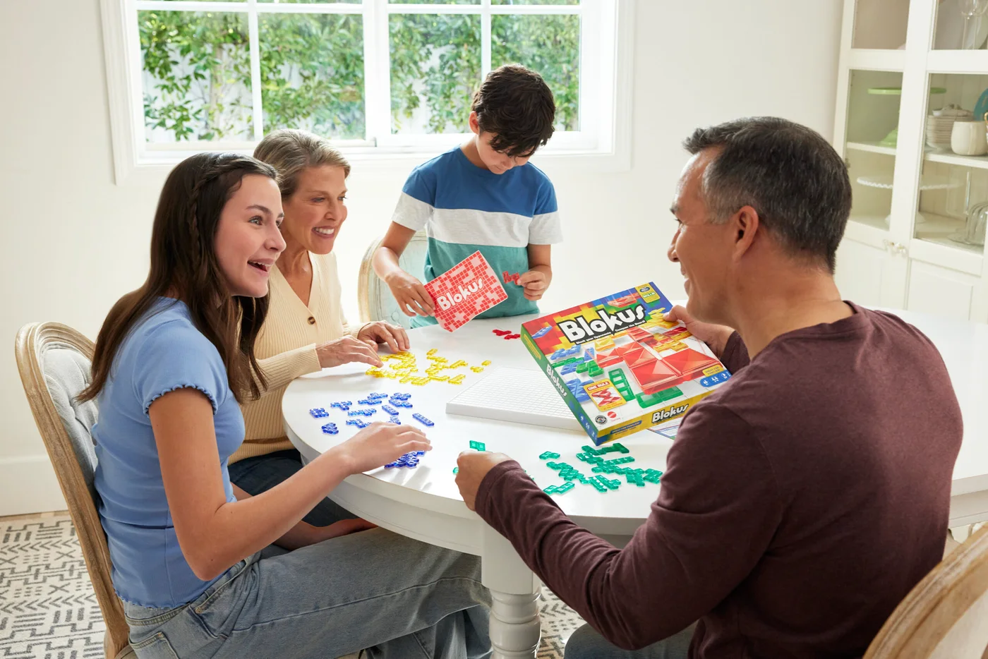Mattel example of four-person tabletop play; international presentation, not a FINDWEAVE test.