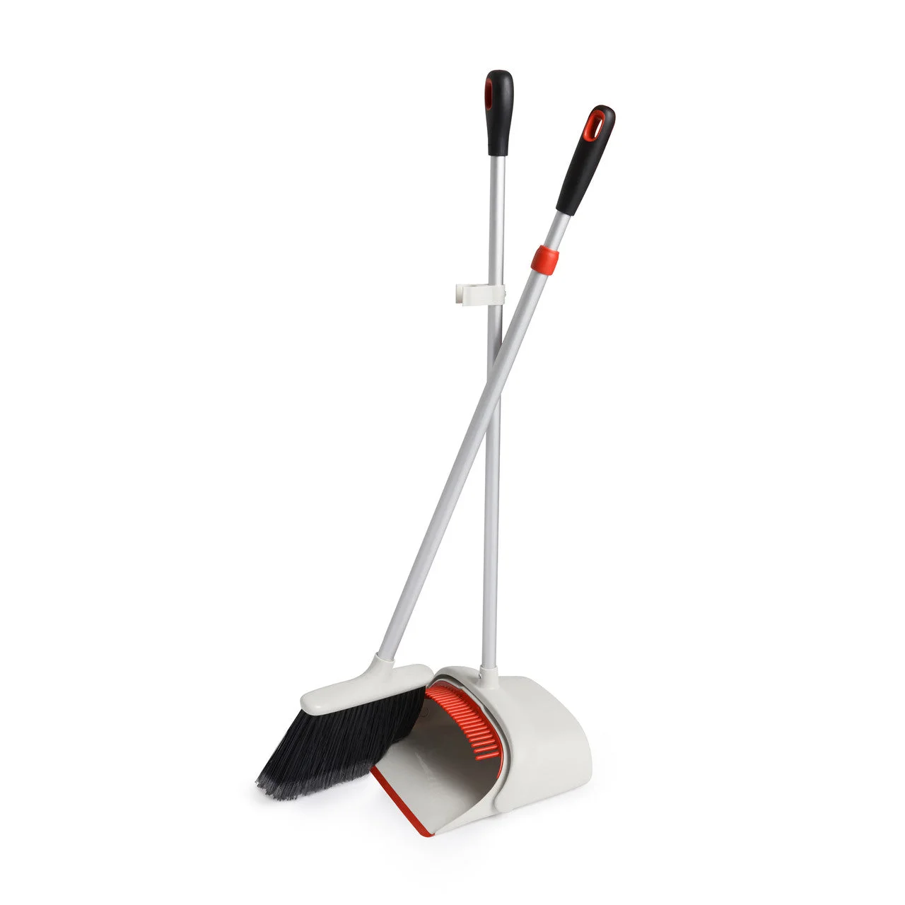 Angled view shows the separate pan and broom arrangement.