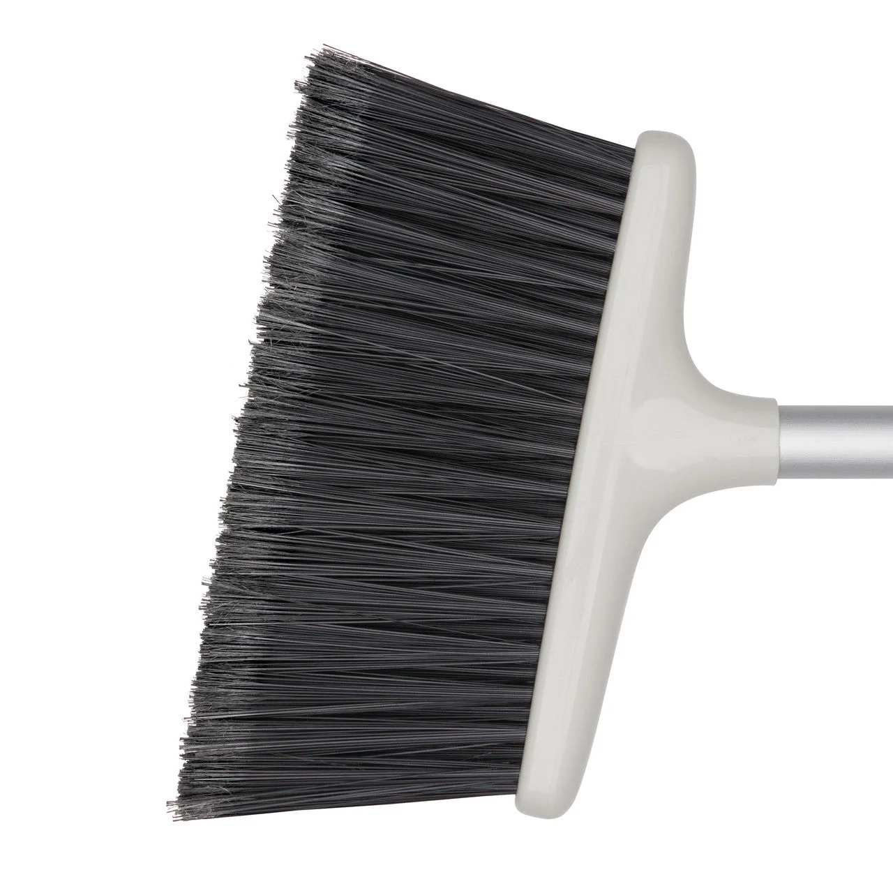 Close view of the soft feathered broom bristles.