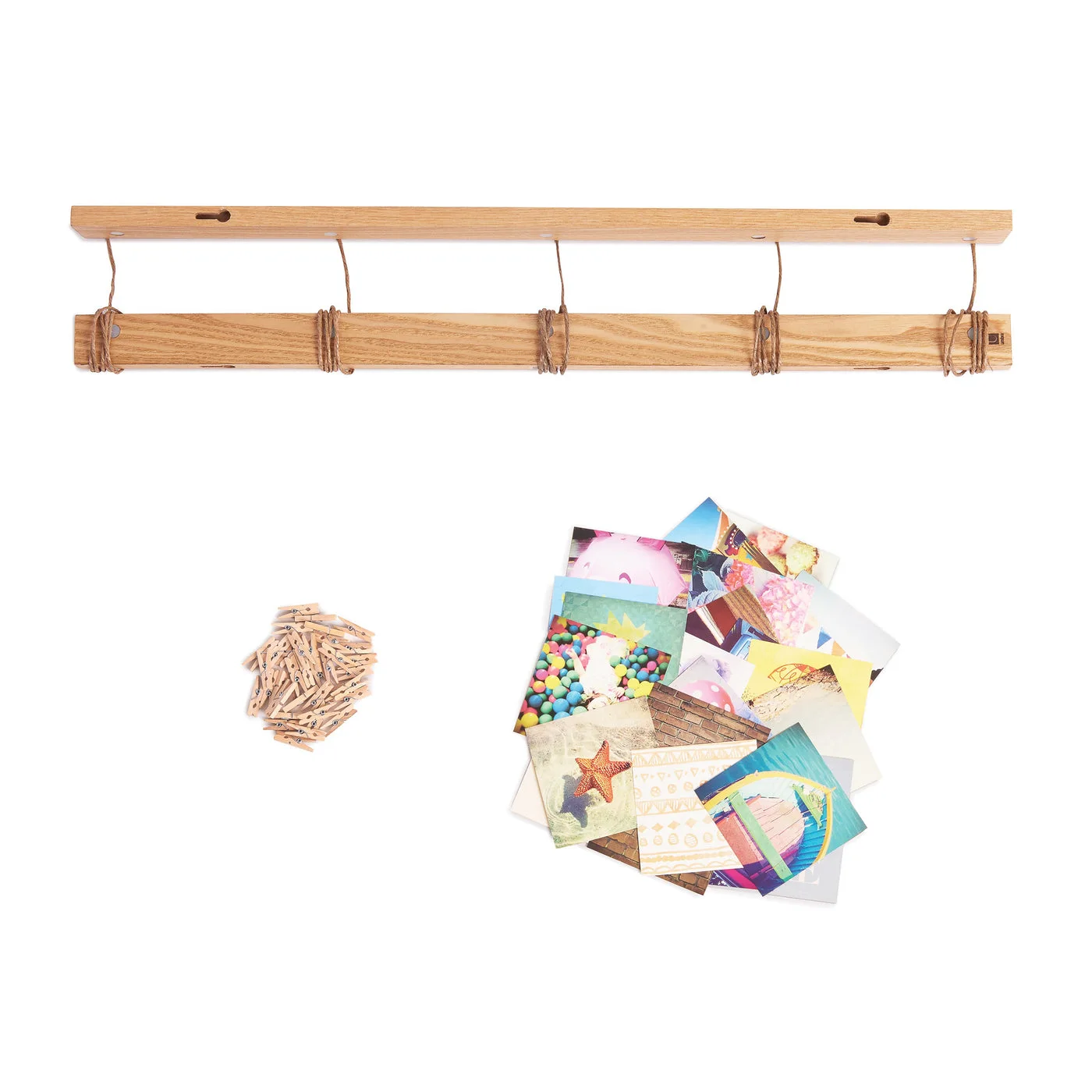 Hangit display collapsed beside styling prints