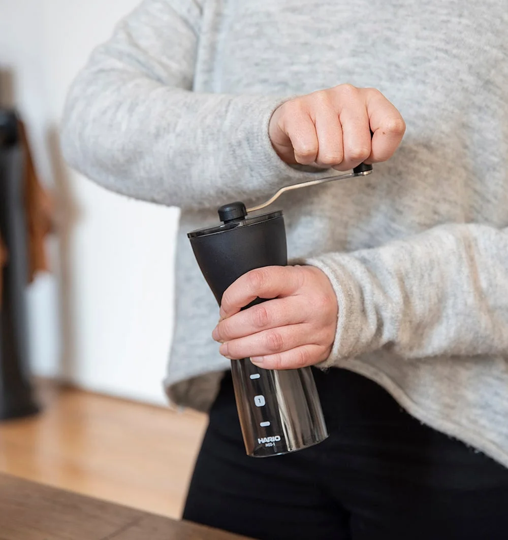 Manual operation requires turning the removable handle.