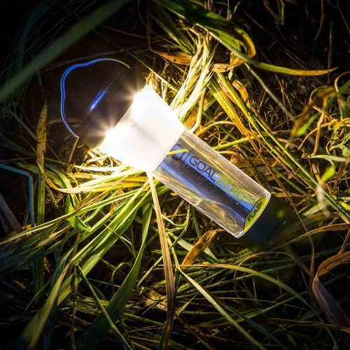 The illuminated lantern face beside the separate flashlight lens.
