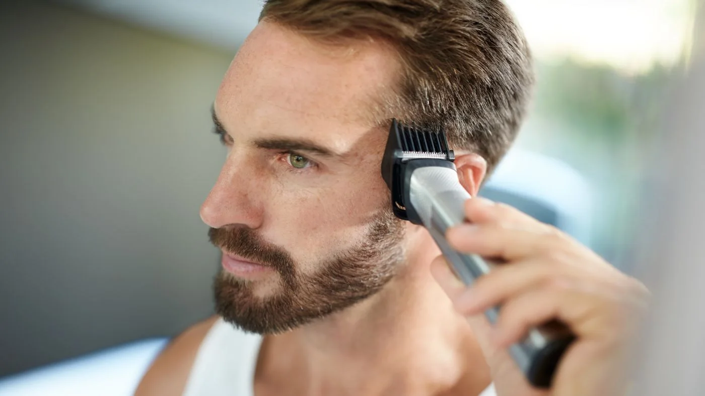 Wider head and guard in a maker hair-trimming reference scene.