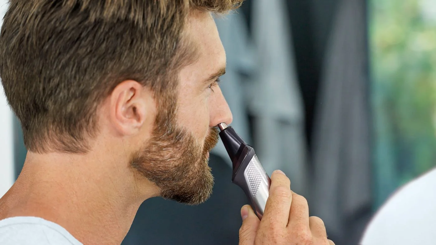 Nose-and-ear attachment in a reference use scene; do not insert deeper than directed.