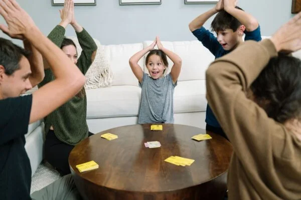 Physical gestures are part of play, so leave space around the table.