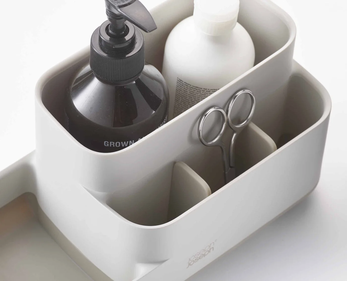 Ecru alternative-colour view of the varied compartments and bottle placement.