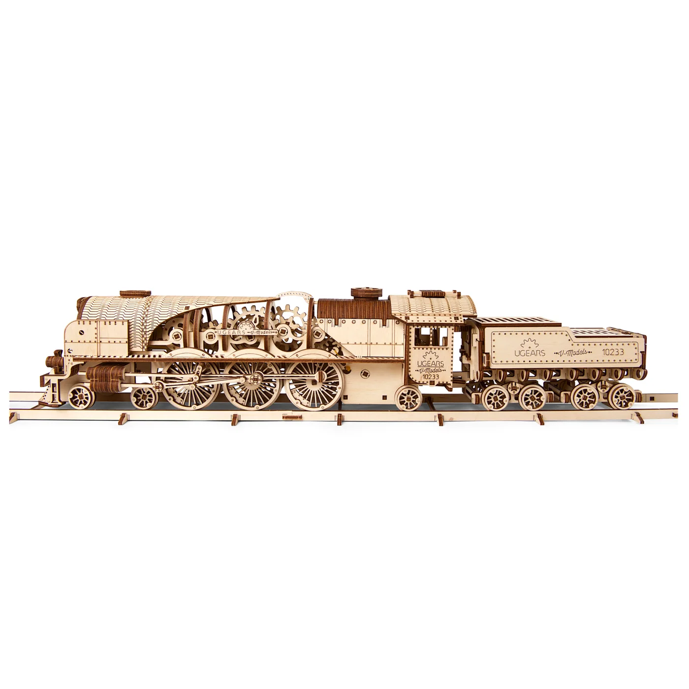Locomotive and tender together on the supplied-style wooden track.