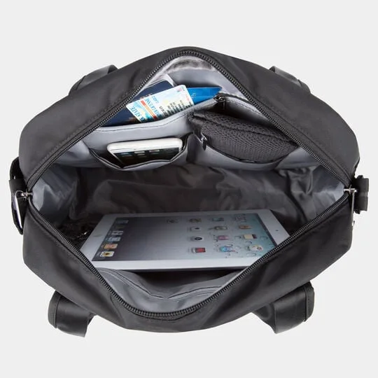Open tote interior with illustrative belongings, not included