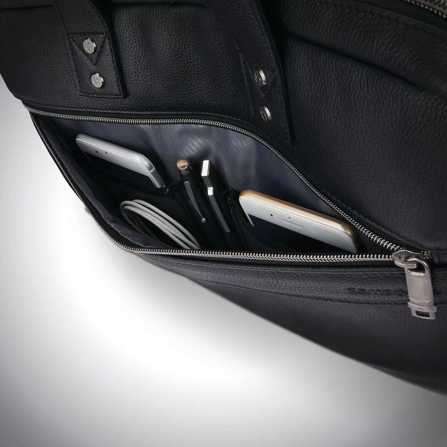 Front pocket organisation for pens and small work accessories.